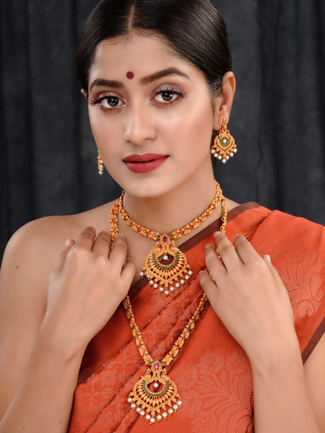 Saraf RS Jewellery Gold-Polished Red & Green Bridal Temple Jewellery Set
