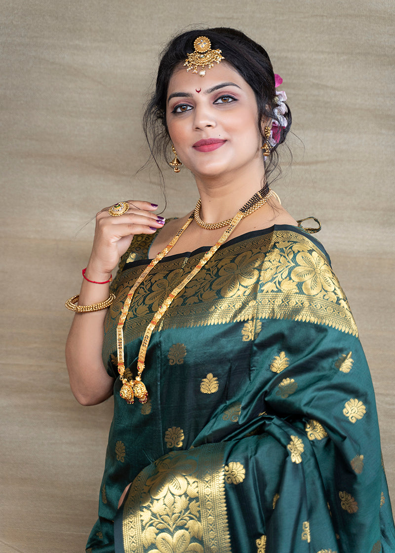 Monjolika Fashion Deep Teal Green Banarasi Silk Blend Saree With Golden Zari Work