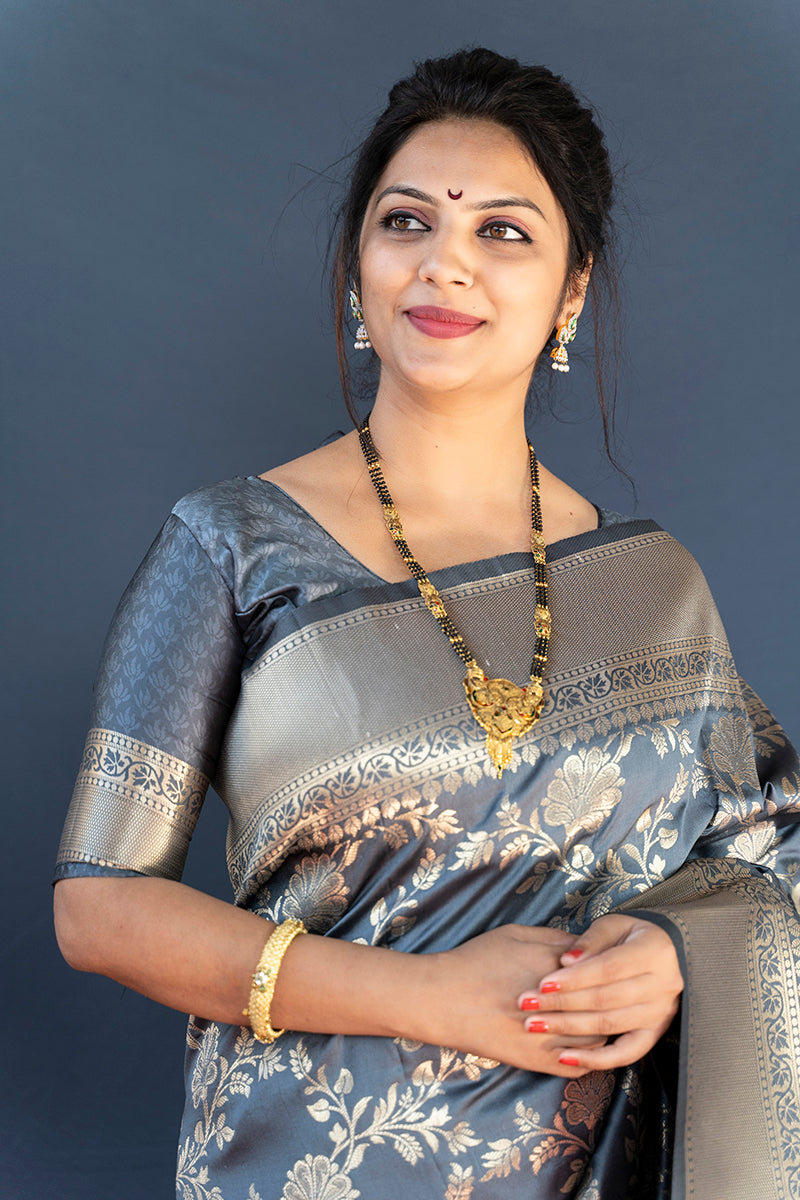 Monjolika Fashion Grey Banarasi Silk Blend Saree With Floral Zari Weaving
