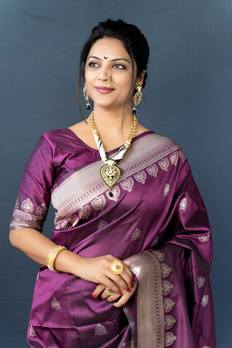 Monjolika Fashion Wine Purple Banarasi Silk Blend Saree with Silver Zari Border & Woven Pallu