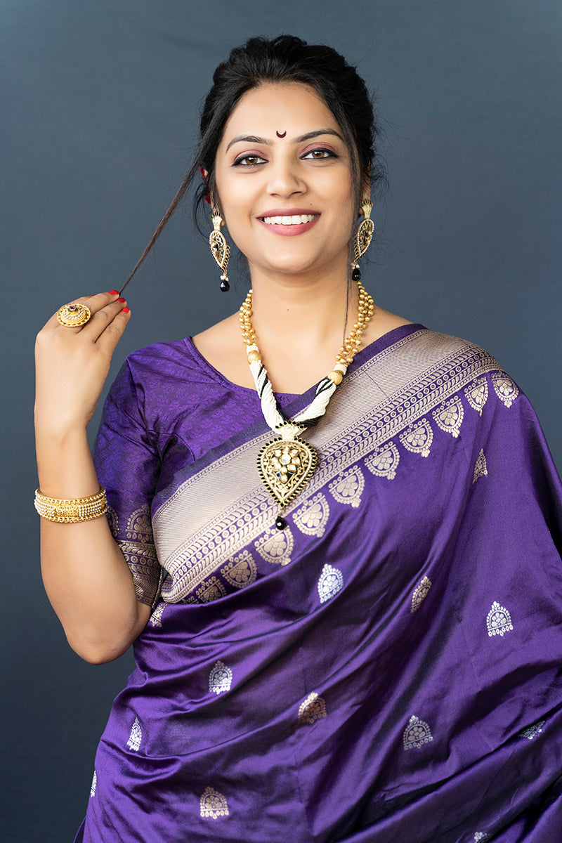 Monjolika Fashion Violet Banarasi Silk Blend Saree with Silver Zari Border & Woven Pallu
