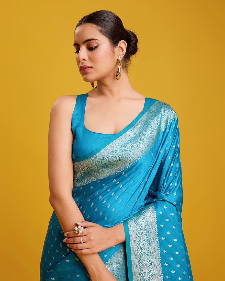 Monjolika Fashion Cyan Color Banarasi Zari Woven Work Enhanced Elegance Silk Saree