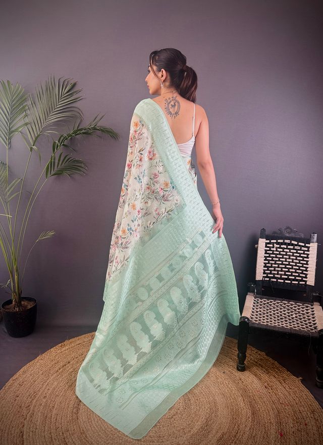 Elora Cyan Blue Silk Floral Motifs Coppery Tone Contrast Floral Border Banarasi Saree