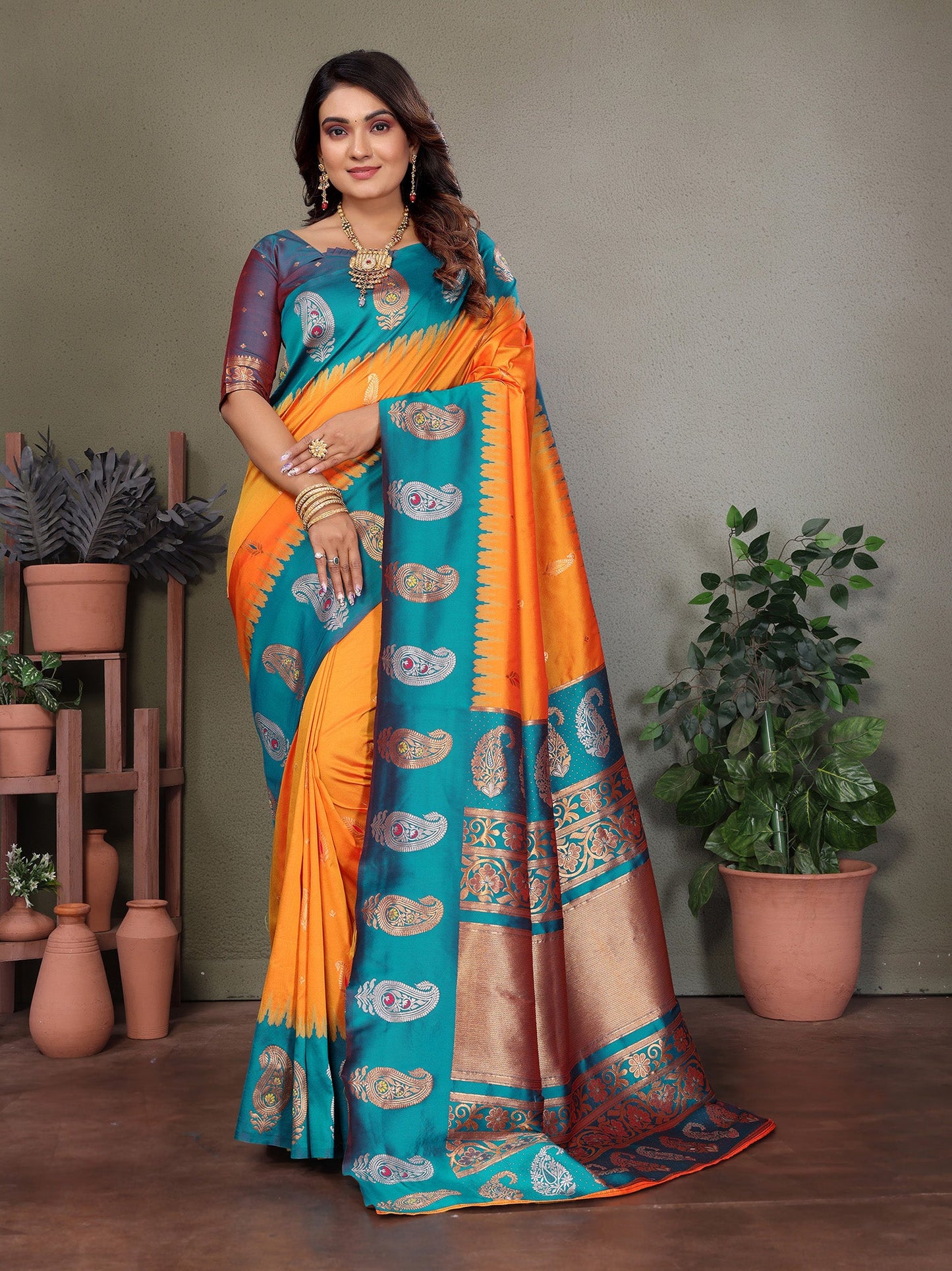 Elora Orange Soft Silk Silver And Golden Zari Weaving Banarasi Saree With Paisley Zari Work Border