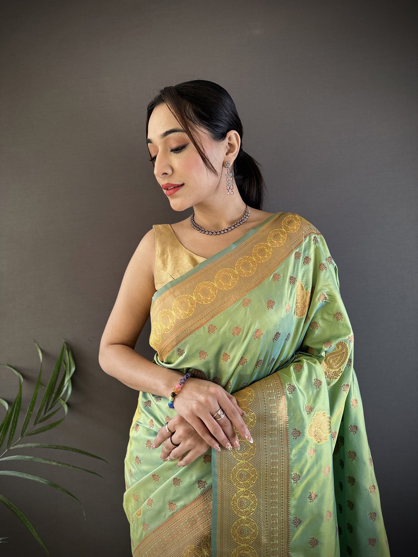 Elora Light Green Soft Silk Woven Copper Zari Weaving Banarasi Saree With Contrast Blouse