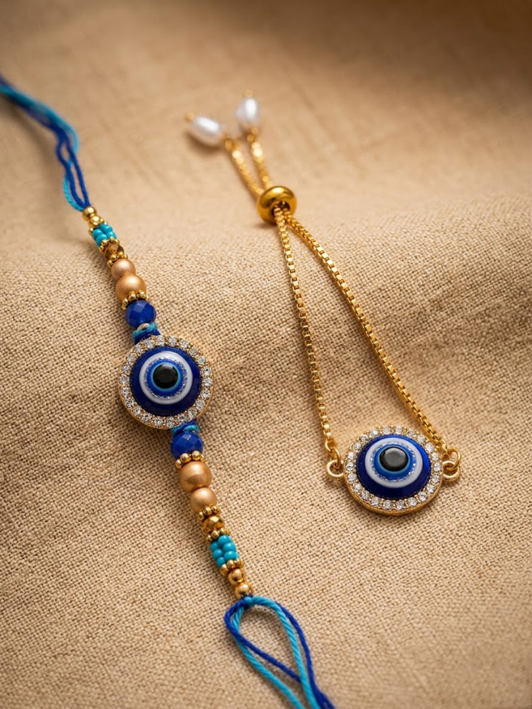NVR Set of 2 Blue Evil Eye Gold Toned Bhaiya Bhabhi Rakhi with Roli Chawal Chandan Mishri