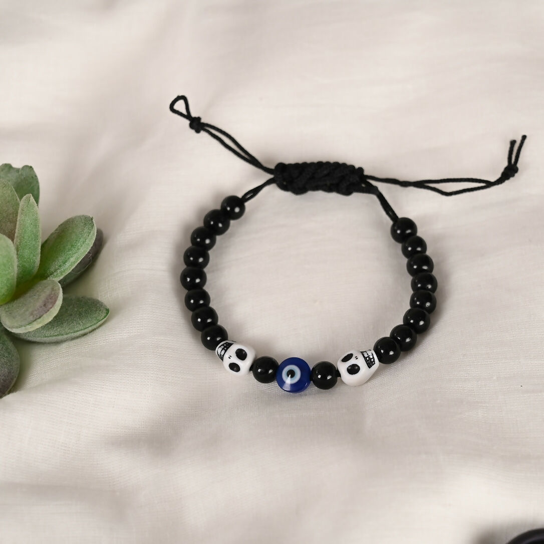 NVR Women & Men Black Evil Eye Rakhi With Roli Chawal