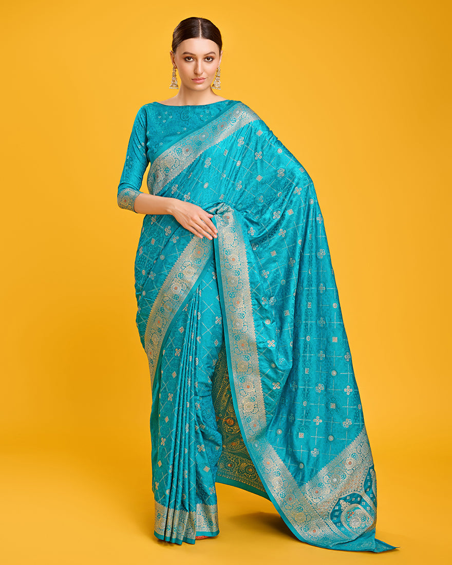 Monjolika Fashion Blushing Cyan Color Banarasi Satin Zari Woven Work Enhanced Elegance Silk Saree