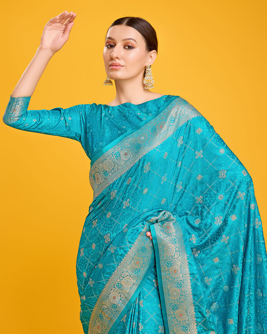 Monjolika Fashion Blushing Cyan Color Banarasi Satin Zari Woven Work Enhanced Elegance Silk Saree