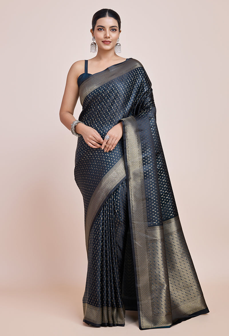 Monjolika Fashion Glamour And Tradition With This Zari Woven Dark Teal Color Banarasi Satin Silk Saree