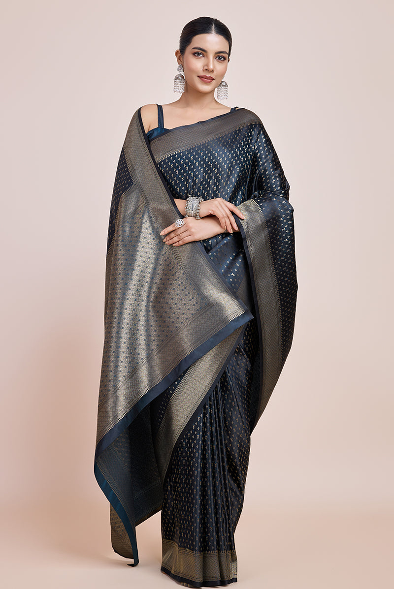 Monjolika Fashion Glamour And Tradition With This Zari Woven Dark Teal Color Banarasi Satin Silk Saree