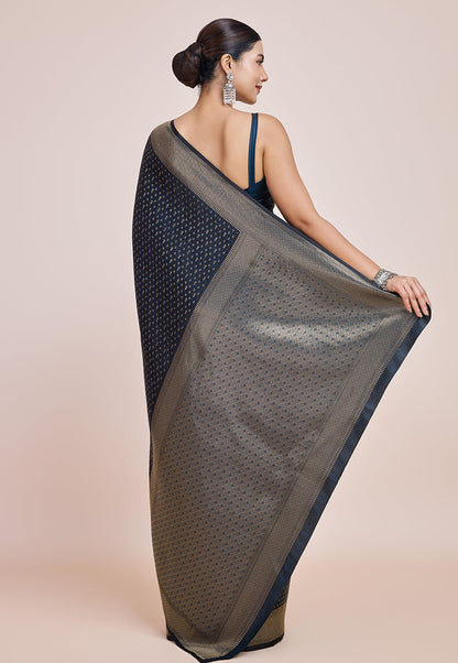 Monjolika Fashion Glamour And Tradition With This Zari Woven Dark Teal Color Banarasi Satin Silk Saree