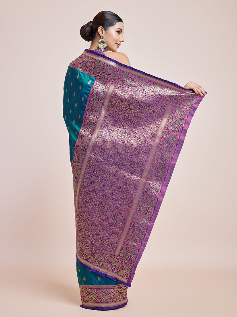 Monjolika Fashion Exquisite Designs With This Teal Banarasi Satin Silk Saree
