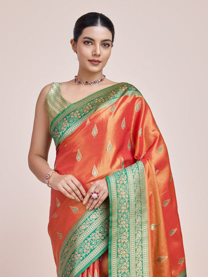 Monjolika Fashion Glamour And Tradition With This Zari Woven Banarasi Tissue Silk Orange Saree
