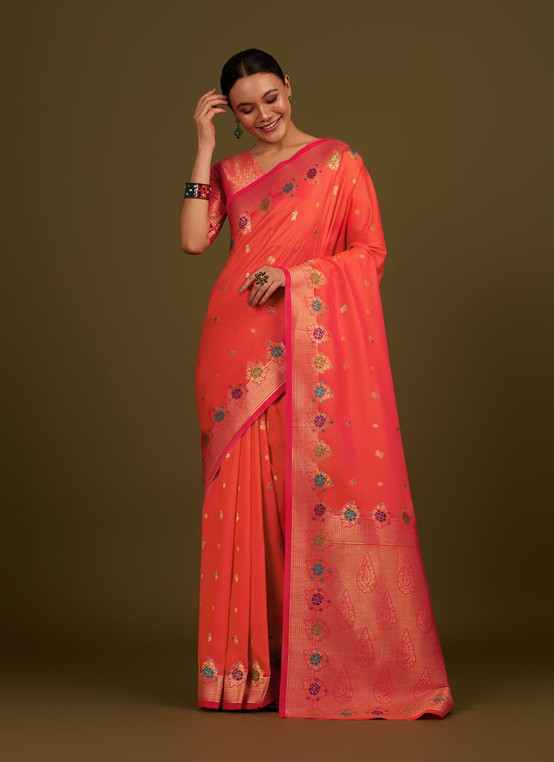 Monjolika Fashion Dark Peach Banarasi Silk Blend SareeWith Zari Woven Detailing