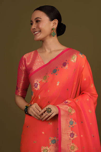 Monjolika Fashion Dark Peach Banarasi Silk Blend SareeWith Zari Woven Detailing