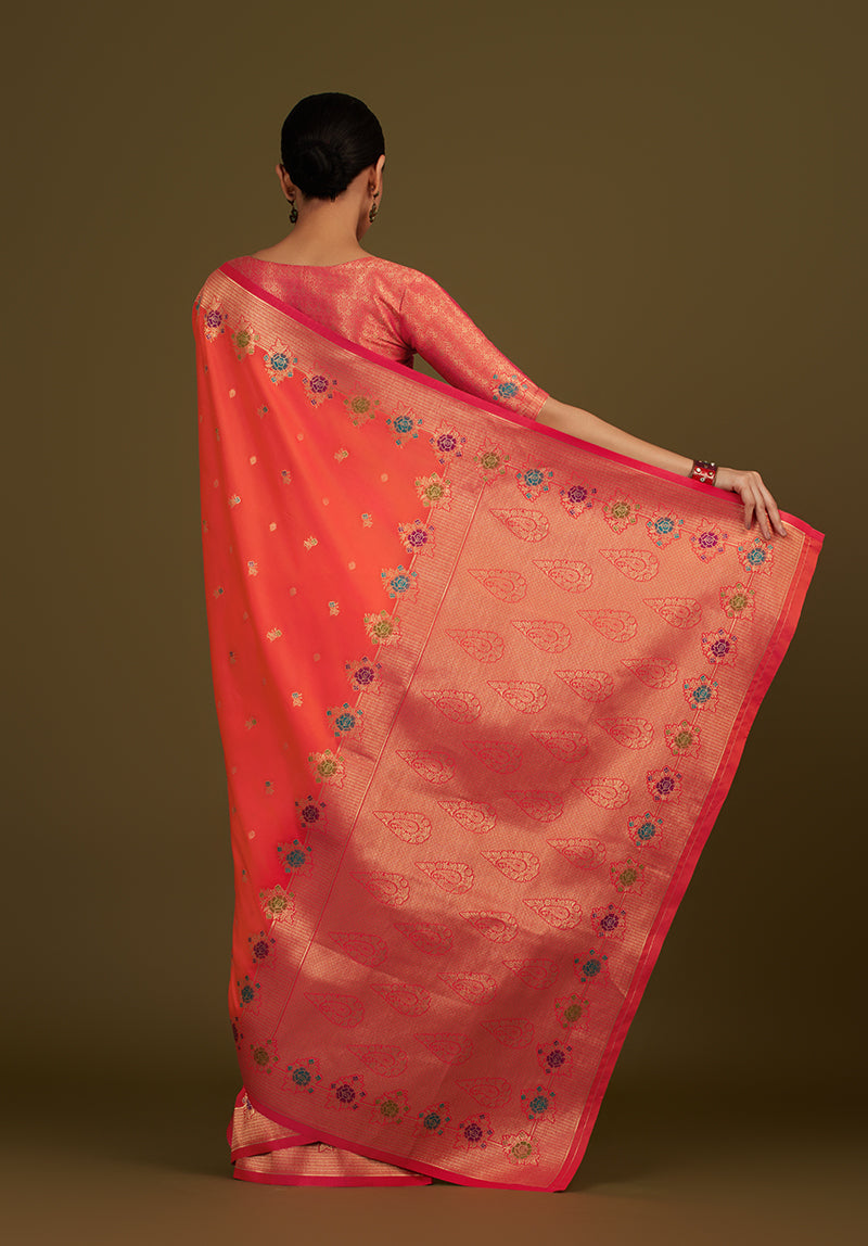 Monjolika Fashion Dark Peach Banarasi Silk Blend SareeWith Zari Woven Detailing