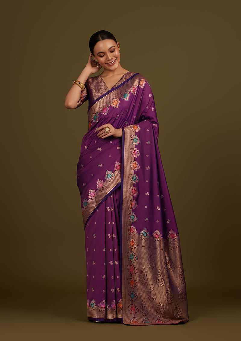 Monjolika Fashion Dark Violet Banarasi Silk Blend SareeWith Zari Woven Detailing