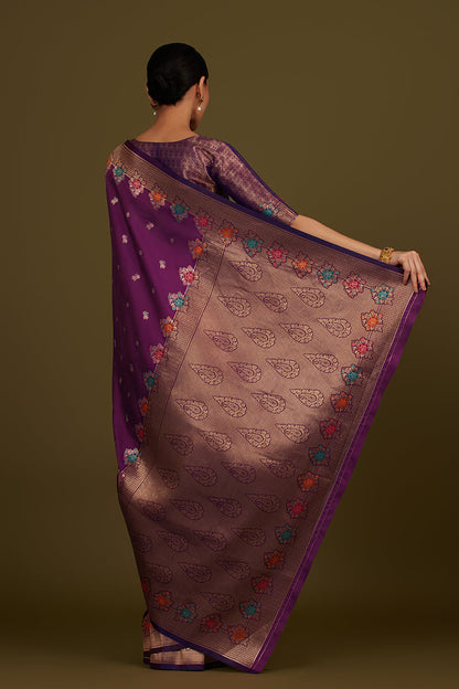 Monjolika Fashion Dark Violet Banarasi Silk Blend SareeWith Zari Woven Detailing