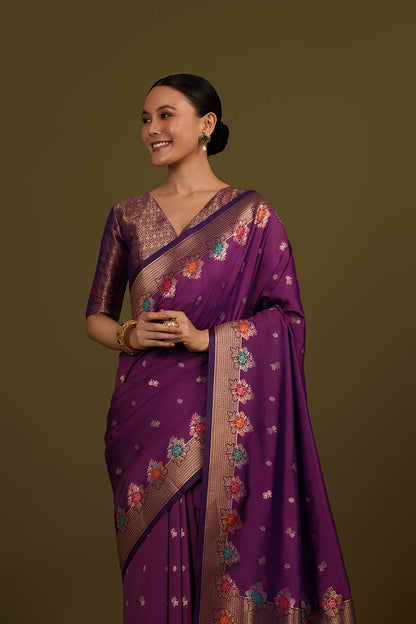 Monjolika Fashion Dark Violet Banarasi Silk Blend SareeWith Zari Woven Detailing