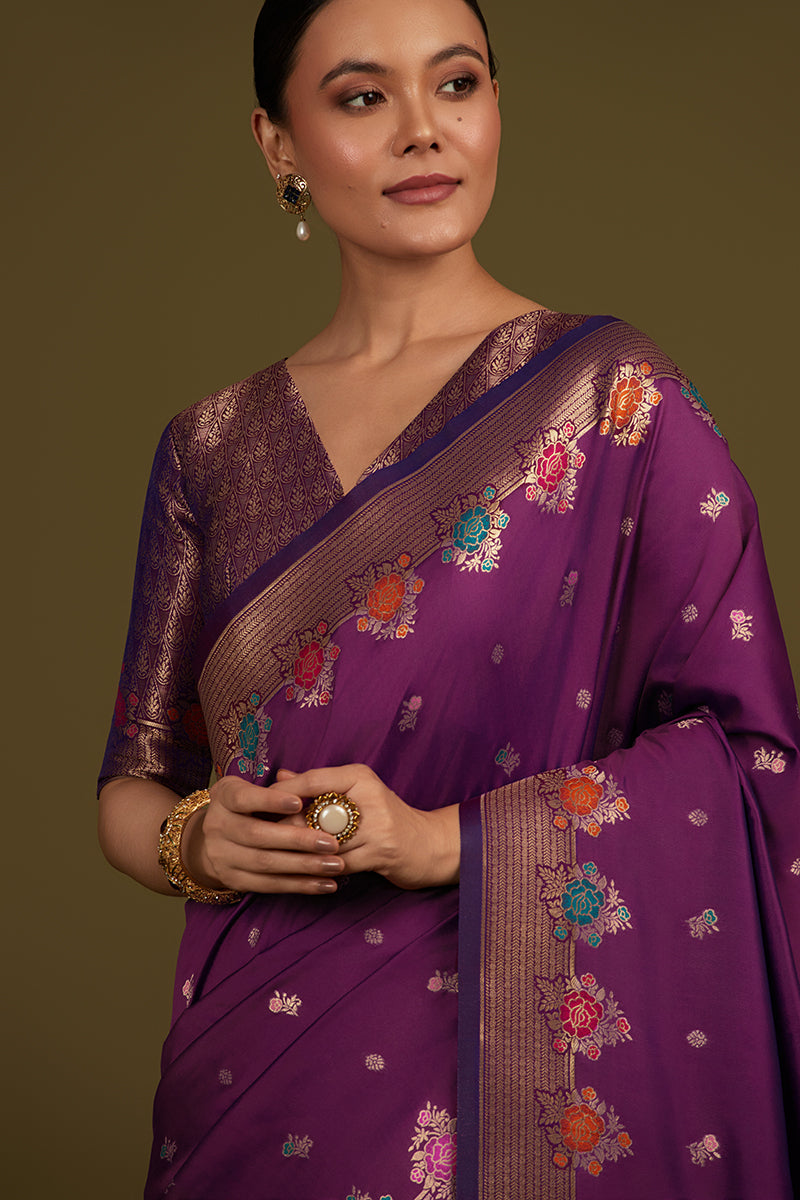 Monjolika Fashion Dark Violet Banarasi Silk Blend SareeWith Zari Woven Detailing