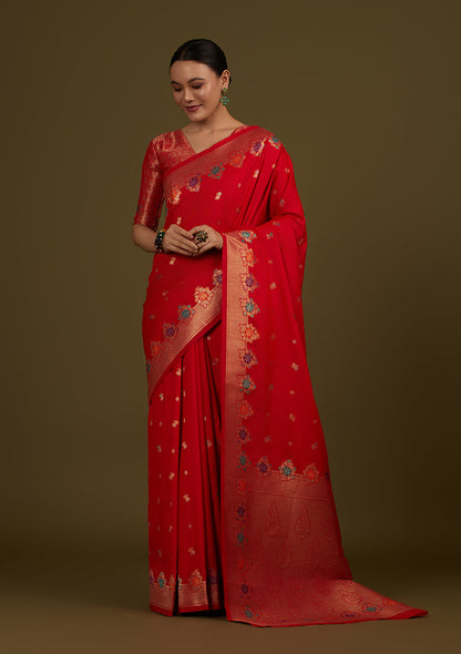Monjolika Fashion Red Banarasi Silk Blend SareeWith Zari Woven Detailing