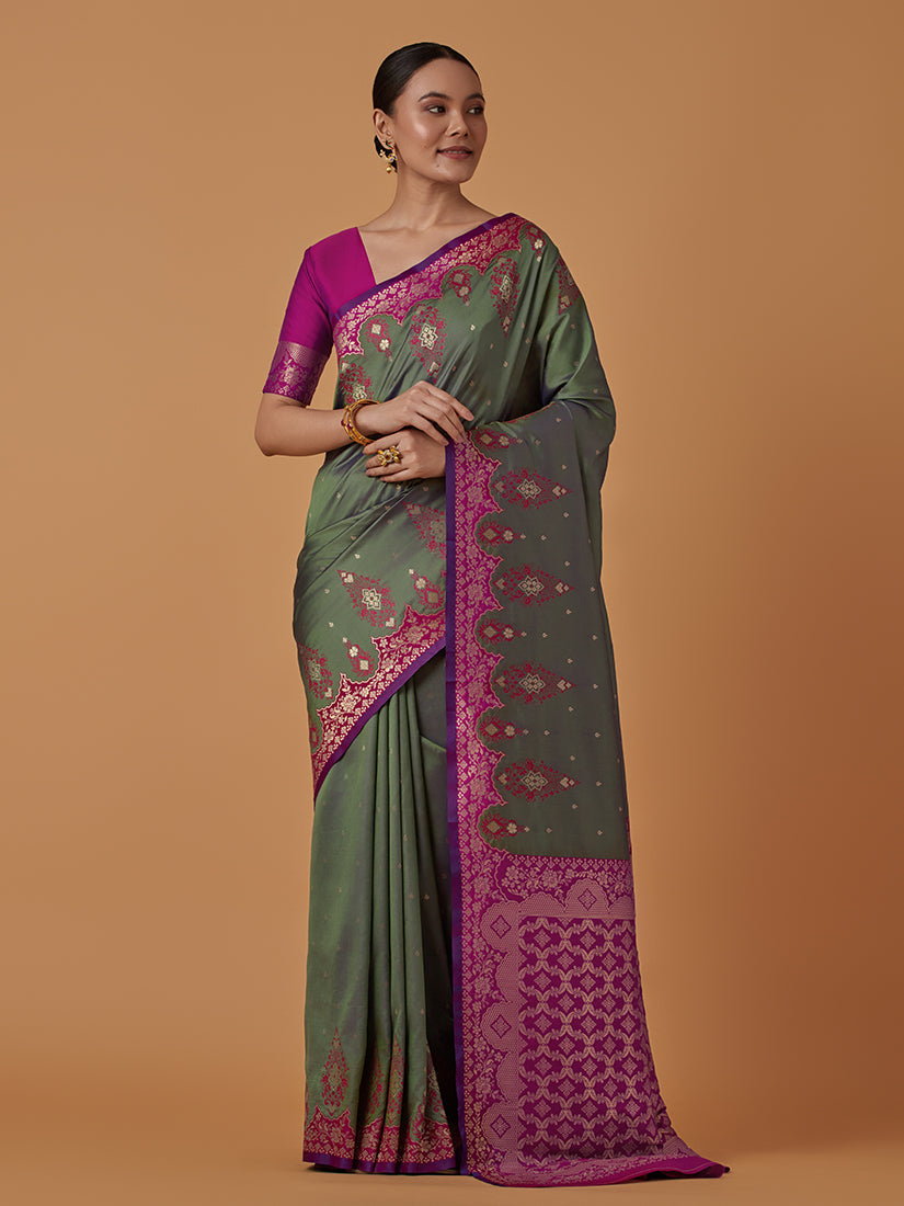 Monjolika Fashion Olive Banarasi Silk Blend SareeWith Zari Woven Rich Brocade Design