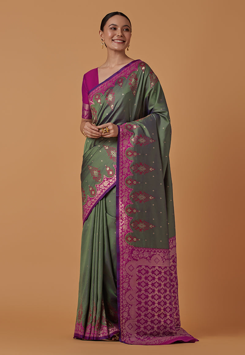 Monjolika Fashion Olive Banarasi Silk Blend SareeWith Zari Woven Rich Brocade Design