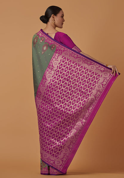 Monjolika Fashion Olive Banarasi Silk Blend SareeWith Zari Woven Rich Brocade Design