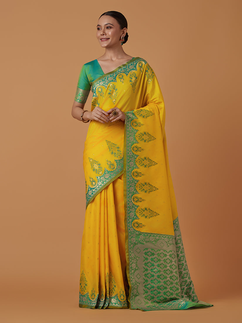 Monjolika Fashion Yellow Banarasi Silk Blend SareeWith Zari Woven Rich Brocade Design