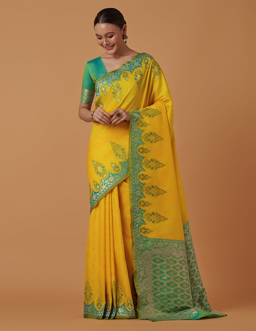 Monjolika Fashion Yellow Banarasi Silk Blend SareeWith Zari Woven Rich Brocade Design