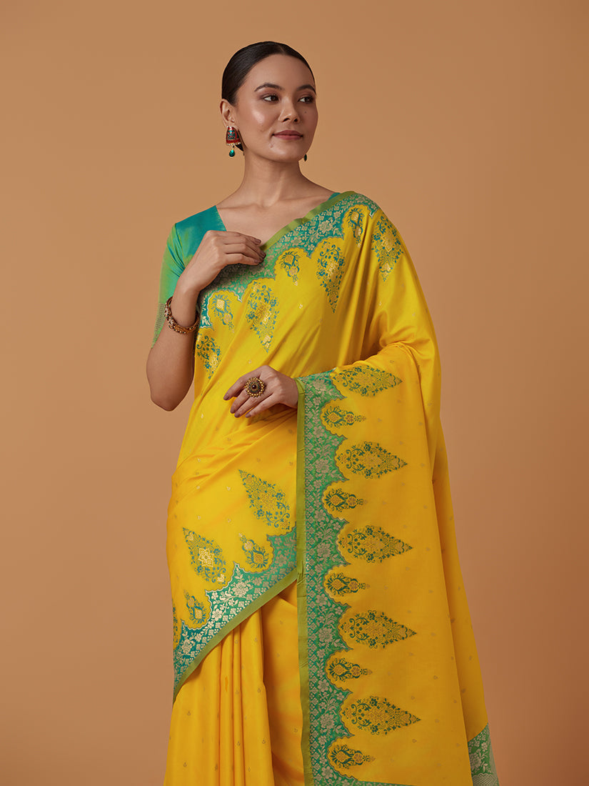 Monjolika Fashion Yellow Banarasi Silk Blend SareeWith Zari Woven Rich Brocade Design