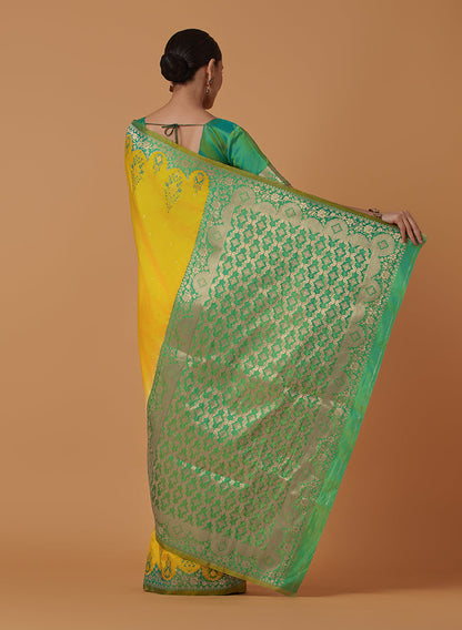 Monjolika Fashion Yellow Banarasi Silk Blend SareeWith Zari Woven Rich Brocade Design