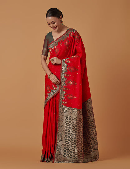 Monjolika Fashion Red Banarasi Silk Blend SareeWith Zari Woven Rich Brocade Design