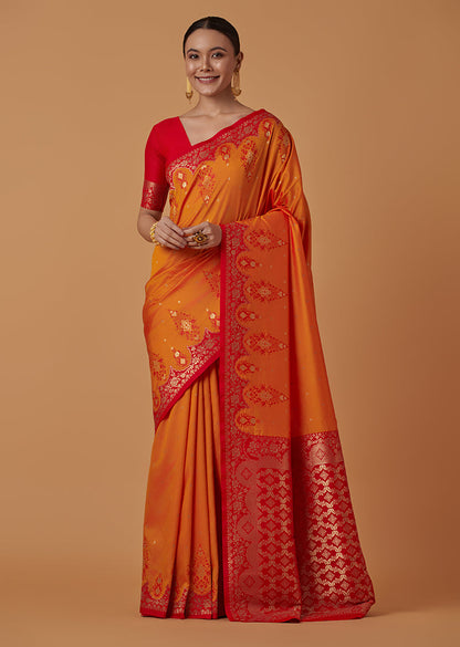 Monjolika Fashion Amber Banarasi Silk Blend SareeWith Zari Woven Rich Brocade Design