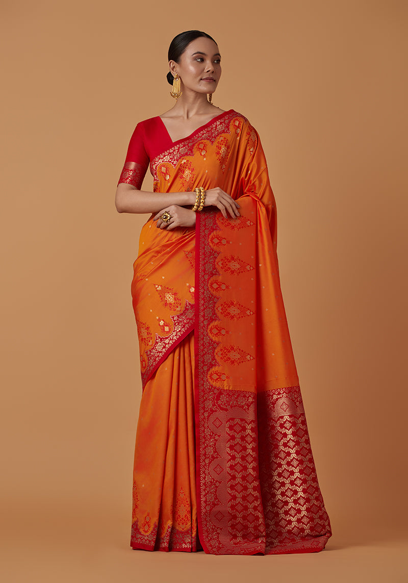 Monjolika Fashion Amber Banarasi Silk Blend SareeWith Zari Woven Rich Brocade Design