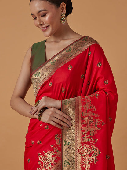 Monjolika Fashion Red Banarasi Silk Blend SareeWith Traditional & Modern Dulha Dulhan Figure Zari Woven Detailing