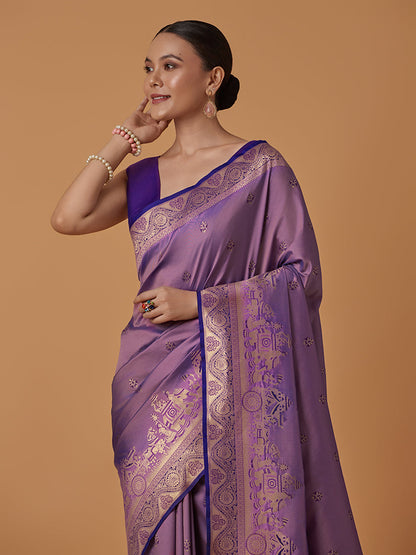 Monjolika Fashion Lavender Banarasi Silk Blend SareeWith Traditional & Modern Dulha Dulhan Figure Zari Woven Detailing