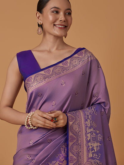Monjolika Fashion Lavender Banarasi Silk Blend SareeWith Traditional & Modern Dulha Dulhan Figure Zari Woven Detailing