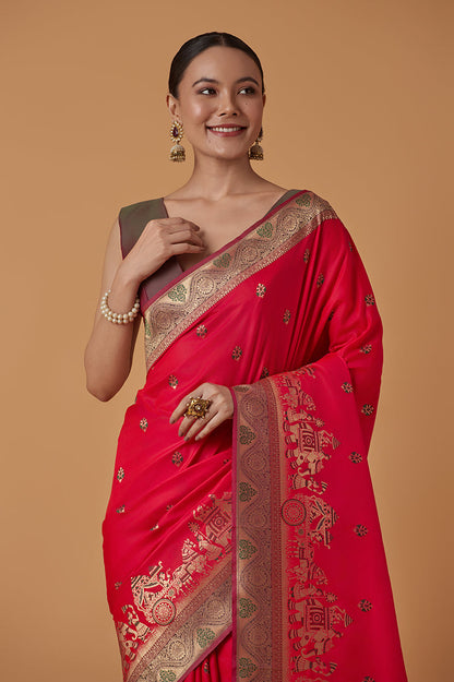 Monjolika Fashion Pink Banarasi Silk Blend SareeWith Traditional & Modern Dulha Dulhan Figure Zari Woven Detailing