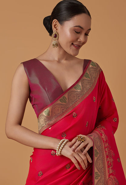 Monjolika Fashion Pink Banarasi Silk Blend SareeWith Traditional & Modern Dulha Dulhan Figure Zari Woven Detailing