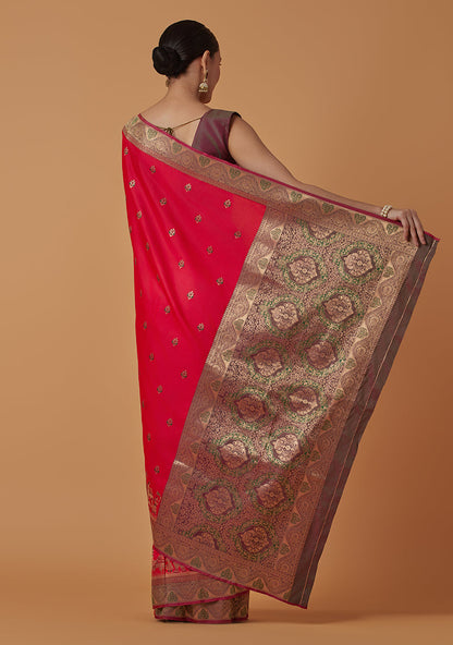 Monjolika Fashion Pink Banarasi Silk Blend SareeWith Traditional & Modern Dulha Dulhan Figure Zari Woven Detailing