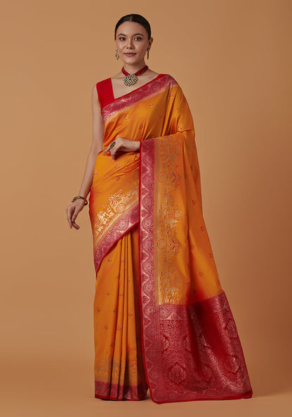Monjolika Fashion Amber Banarasi Silk Blend SareeWith Traditional & Modern Dulha Dulhan Figure Zari Woven Detailing