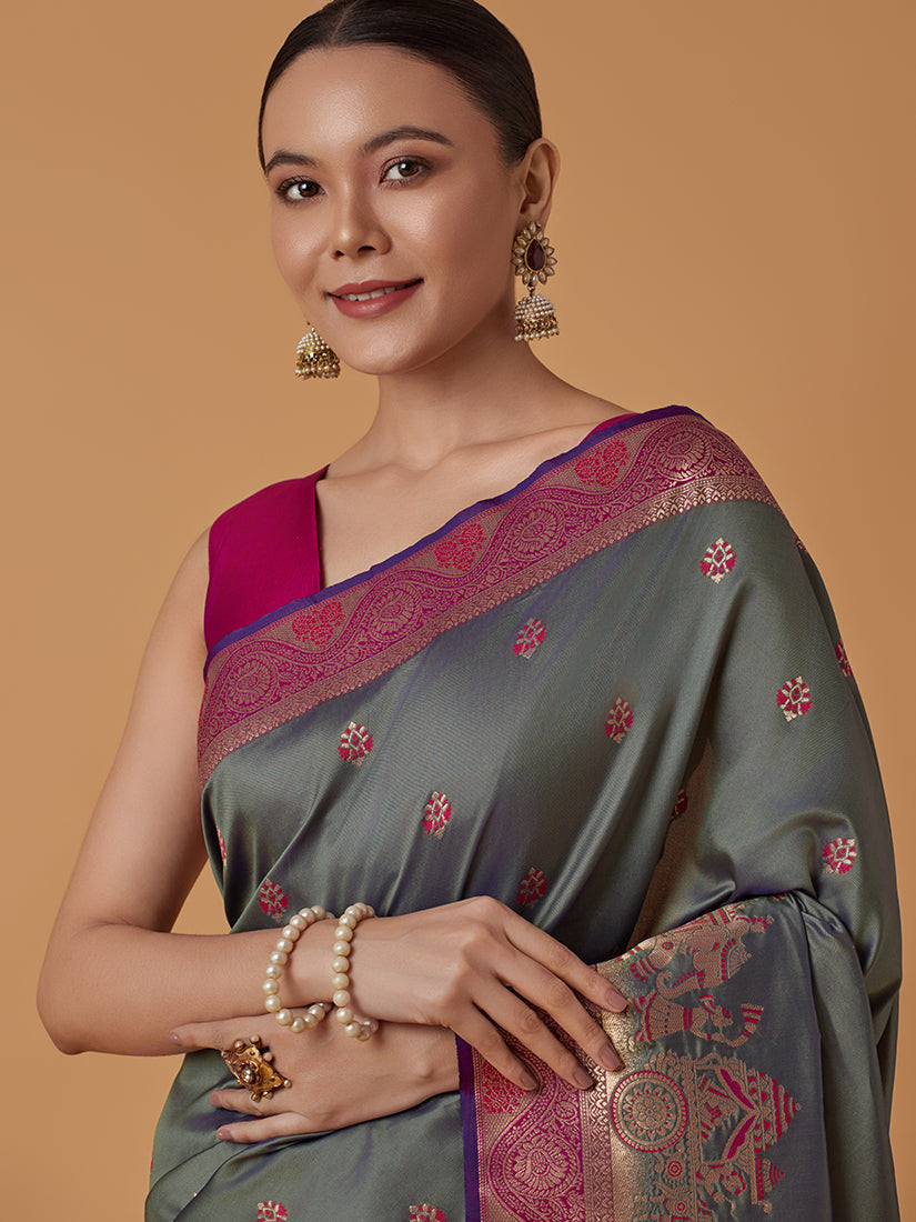 Monjolika Fashion Olive Banarasi Silk Blend SareeWith Traditional & Modern Dulha Dulhan Figure Zari Woven Detailing