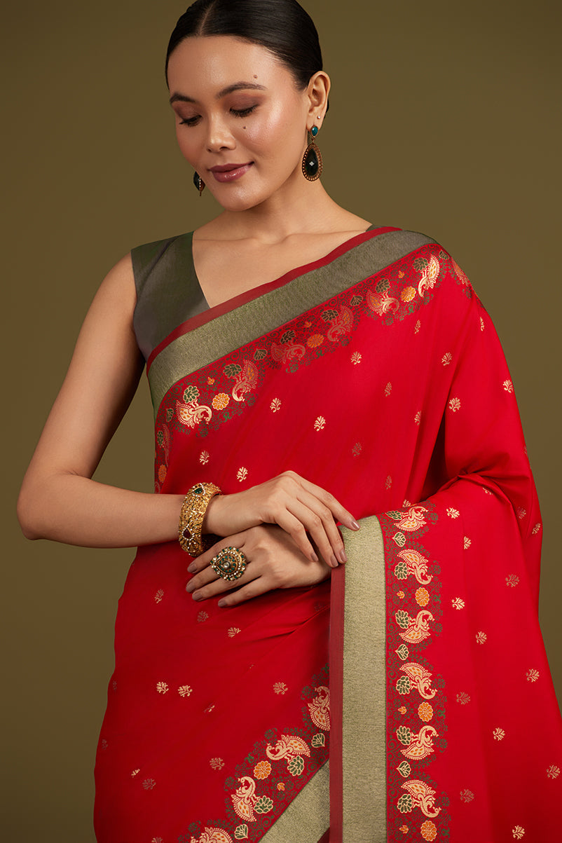 Monjolika Fashion Red Banarasi Silk Blend SareeIn Classic Paisley & Rich Zari Pallu Comes With Unstitched Blouse