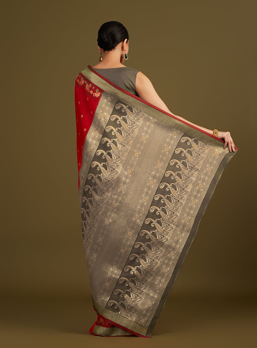 Monjolika Fashion Red Banarasi Silk Blend SareeIn Classic Paisley & Rich Zari Pallu Comes With Unstitched Blouse