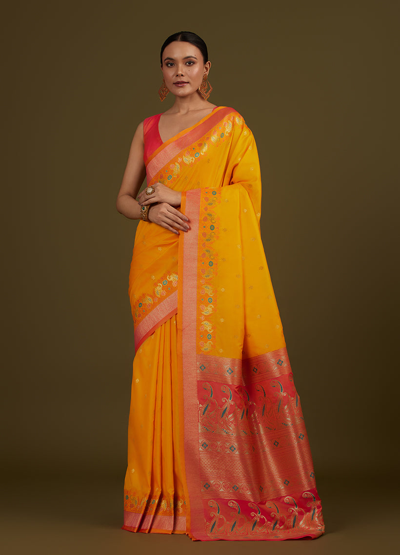 Monjolika Fashion Yellow Banarasi Silk Blend SareeIn Classic Paisley & Rich Zari Pallu Comes With Unstitched Blouse
