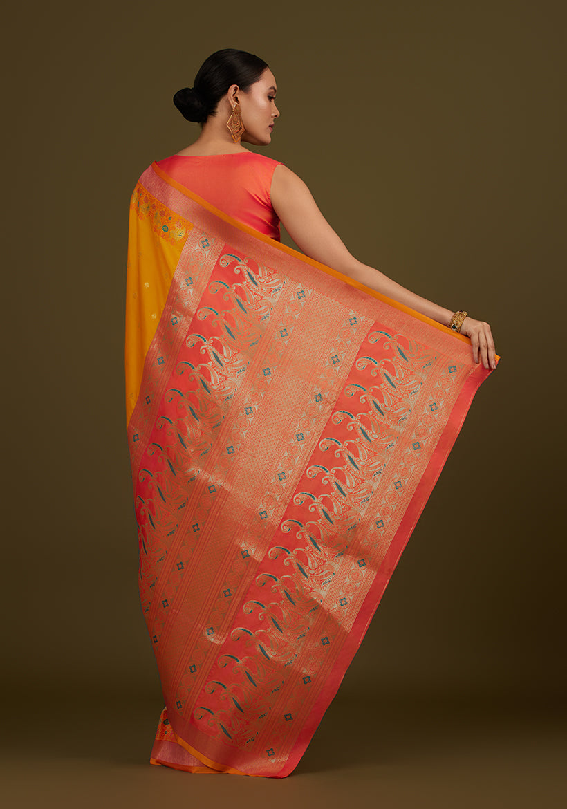 Monjolika Fashion Yellow Banarasi Silk Blend SareeIn Classic Paisley & Rich Zari Pallu Comes With Unstitched Blouse