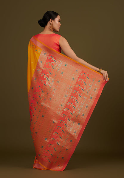 Monjolika Fashion Yellow Banarasi Silk Blend SareeIn Classic Paisley & Rich Zari Pallu Comes With Unstitched Blouse