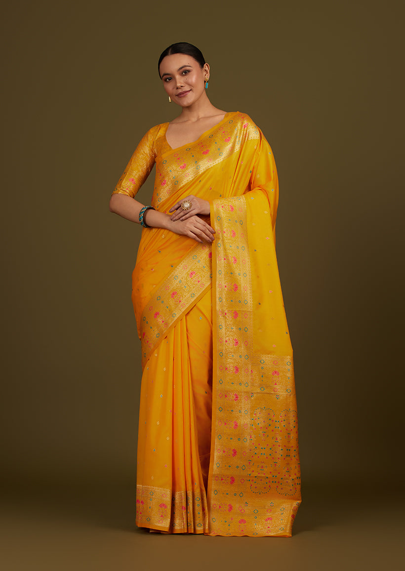 Monjolika Fashion Elegant Yellow Banarasi Silk Blend SareeBrocade Motifs & Zari Woven Splendor